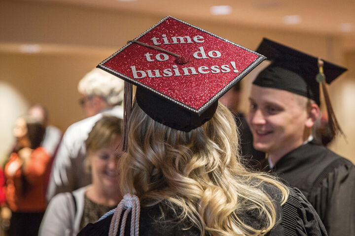 Kelley School of Business-IUPUI graduate with cap reading "time to do business"